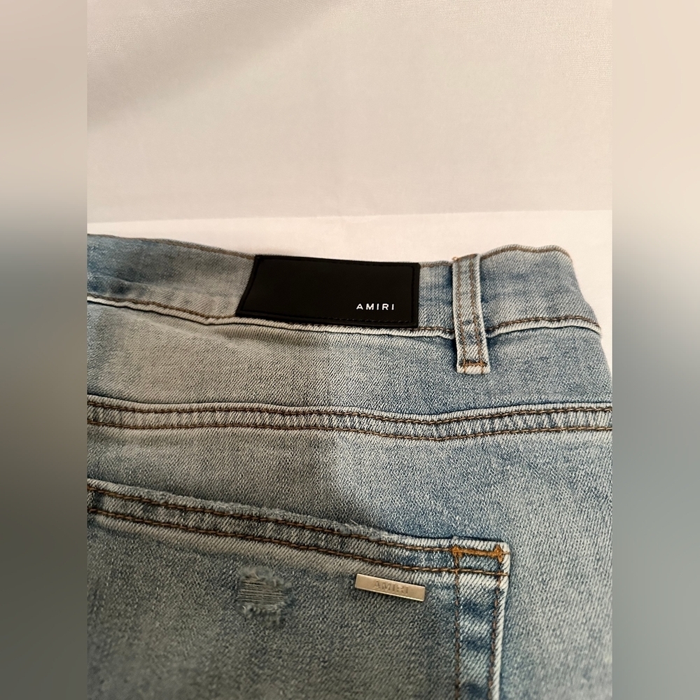 AMIRI Faded Blue Slim Jeans with Black Logo - Picture 3 of 4